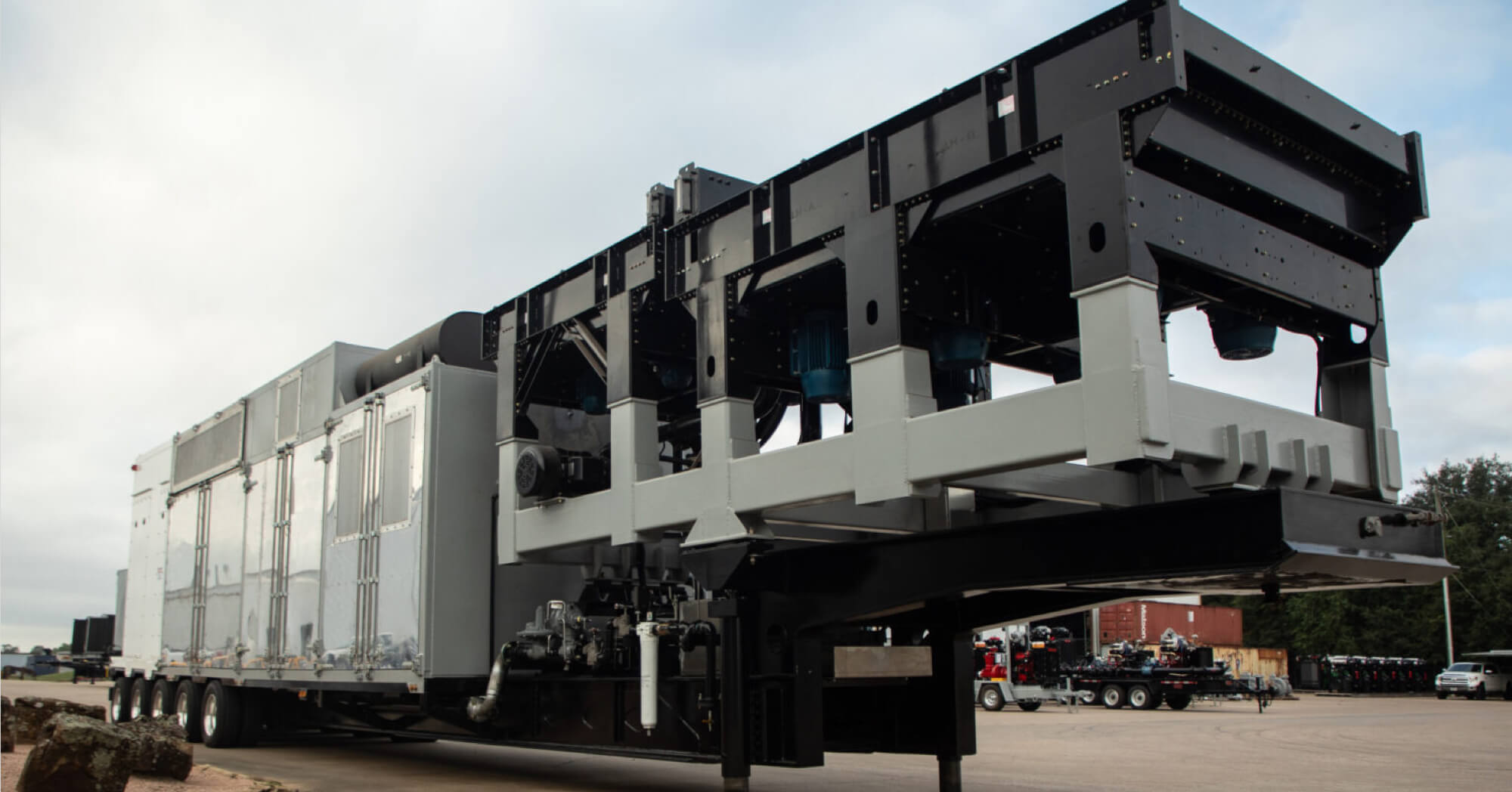 Dragon POWERGR26M Industrial generator parked in a large parking lot.