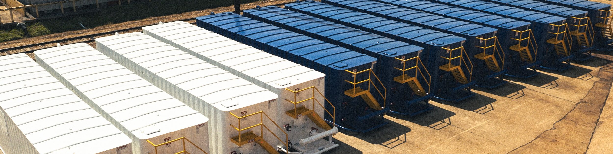Frac-Tanks-Carousel-Graphic-2500x630-1-qghd74hqbsgztti93t86raxc7578bw949lgjsj9tp8